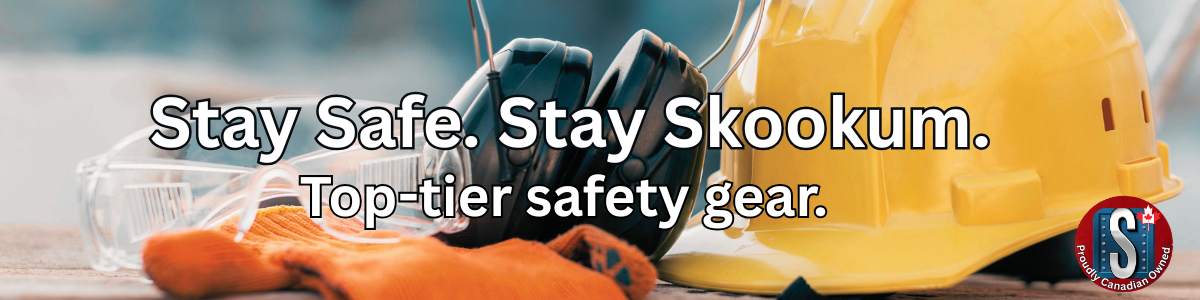Safety gear including gloves, safety glasses, hearing protection, and a hard hat on a workbench with text reading "Stay Safe. Stay Skookum. Top-tier safety gear". Image represents Skookum Tools' safety equipment category.